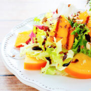 appetizing salad with persimmons